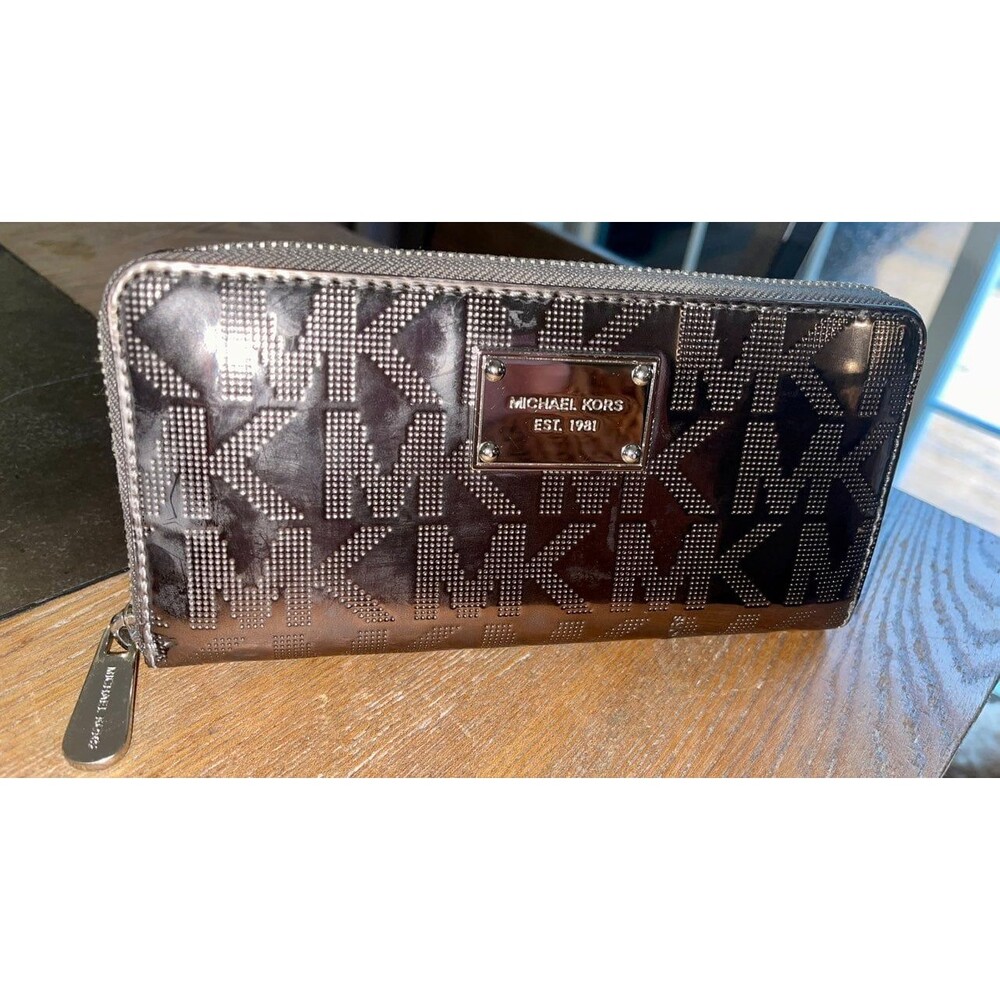 Michael Kors silver metallic zip around wallet